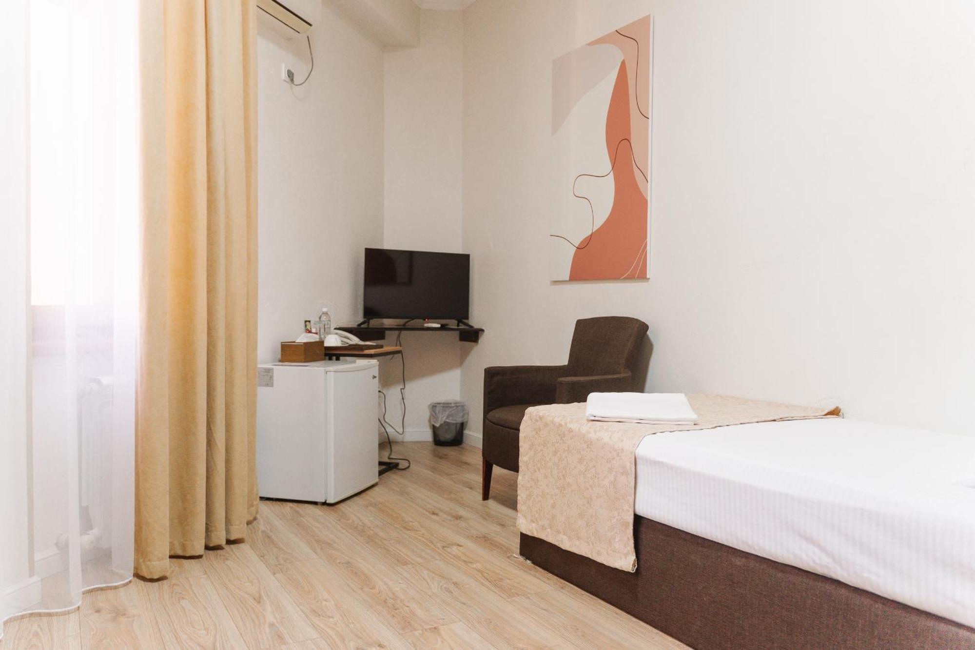 Hotel Bellagio Shymkent Exterior photo