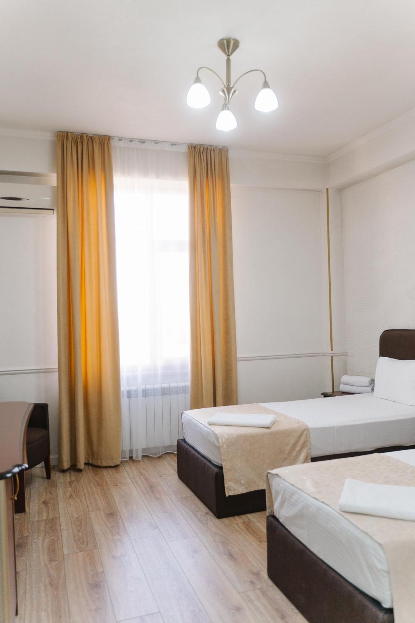 Hotel Bellagio Shymkent Exterior photo